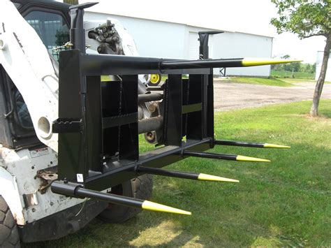 double fork bale spear skid steer|skid steer round bale spear.